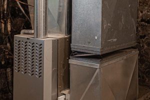 Stacked air handlers with pipes and vents